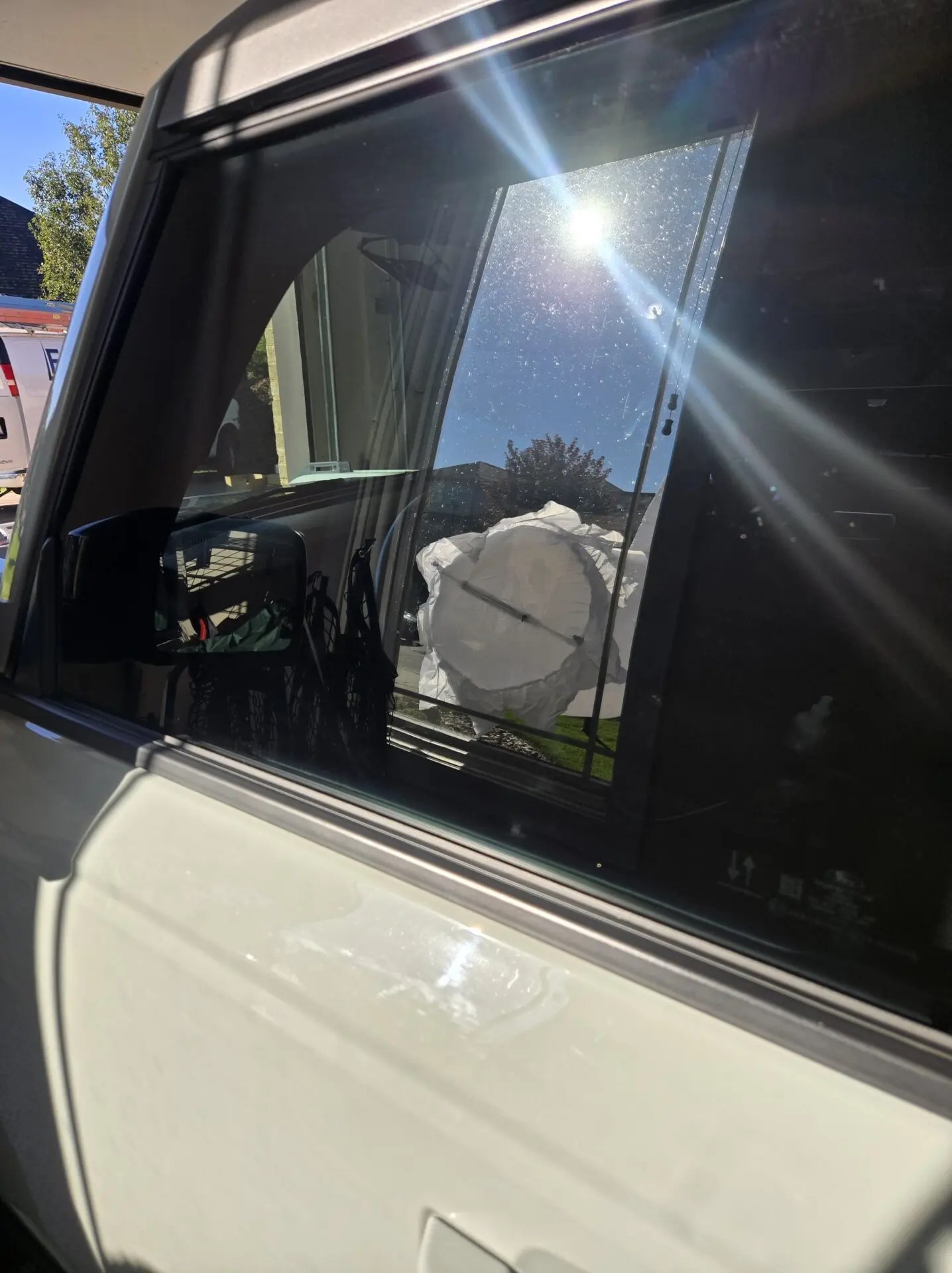 Vehicle with freshly applied window tint